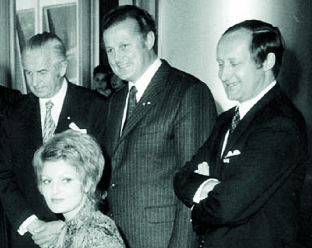 Herbert Quandt (left) and a few BMW shareholders. Check out the look on the guy from the right.