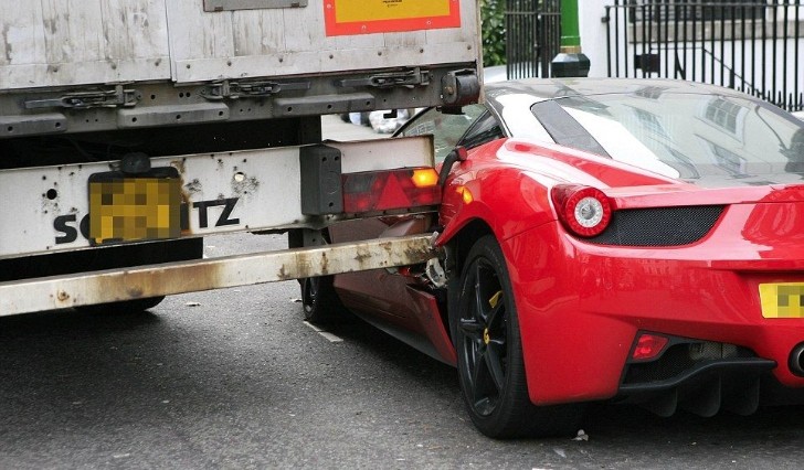 Truck Opens Ferrari 458 Italia Like a Can of Sardines