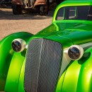 "Brutally Sexy" started out as a '36 Chevy Master Sedan, is now a fully-custom crew cab dually
