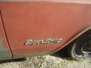 1965 Chevrolet sitting in a yard