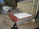 1965 Chevrolet sitting in a yard