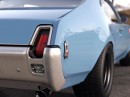 1969 Oldsmobile Cutlass Outlaw Porsche Etna Blue muscle car rendering by abimelecdesign