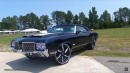 1972 Oldsmobile Cutlass Convertible in Midnight Blue with 24-inch concave wheels and LS3 swap