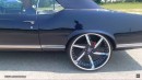 1972 Oldsmobile Cutlass Convertible in Midnight Blue with 24-inch concave wheels and LS3 swap