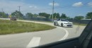 2020 Shelby GT500 races against a Charger Hellcat, both stock