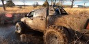 RAM 1500 TRX on 44-inch mud boggers doing its thing