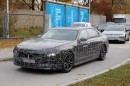 2023 BMW i7 prototype being compared with other electric sedans