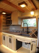 This tiny home on wheels isn't tiny at all, boasts a spacious interior filled with interesting features