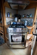 This tiny home on wheels isn't tiny at all, boasts a spacious interior filled with interesting features