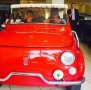 50 Cent Sitting in a Fiat 500
