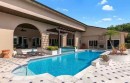Mansion located in Florida aviation community comes with 2 private hangars, garage, and resort-like amenities