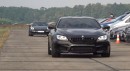 BMW M6 takes on a Toyota GR Supra over a half-mile, both tuned