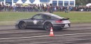 950 HP Porsche 911 Turbo Driver Spins during 760 HP BMW M5 Drag Race
