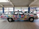 The only car painted by George Lilanga has an asking price of $2.3 million