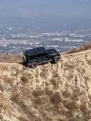 Jeep Wrangler drives up bike trail, gets stuck on mountain ridge