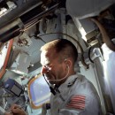NASA astronaut Walter Cunningham writes with a Fisher Space Pen