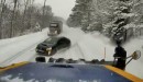 Subaru WRX slams into snowplow on a snow-packed road