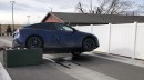 Tesla climbed on a power box at a McDonald's drive thru
