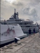 Eco-activists target the 2017 Oceanco custom superyacht Kaos with spray paint