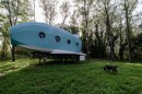 The Jet House is a charming airplane-shaped cabin in the woods