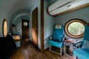 The Jet House is a charming airplane-shaped cabin in the woods