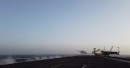 Aircraft taking off and landing on the USS Dwight D. Eisenhower