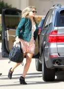 Ali Larter and her BMW X5