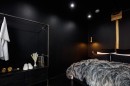 Former Victorian Mill warehouse hides Batman-inspired apartment painted fully in black