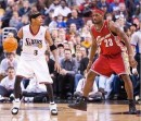 Allen Iverson guarded by LeBron James