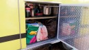 This Ambulance Camper Is a Budget-Friendly Tiny Home/Workshop on Wheels