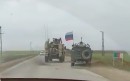 American soldiers push Russian troops off the road