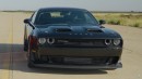 An Epic Showdown Between a V8 Dodge Challenger Black Ghost and a Fully Electric KIA EV6 GT