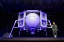 Jeff Bezos next to the Blue Moon lander concept for making deliveries to the Moon