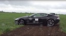Aston Martin DBS stuck in mud
