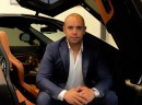 Australian businessman parks his expensive cars inside his office as motivation for his staff