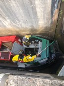 Three-barge bachelor party ends predictably bad, with one narrowboat underwater, stuck at a lock