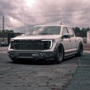 Bagged 2021 Ford F-150 Raptor Gen 3 riding on air suspension with 37s in rough metal rendering by bradbuilds on Instagram