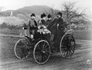 Carl and Bertha Benz, their daughter Klara and Fritz Held on a Benz Victoria.