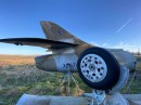 big collection of aircraft, military vehicles, and rally cars