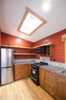 Big Red tiny house with huge kitchen and bathroom