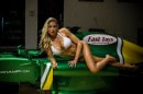 Bikini Blonde Christina Riordan Poses on Caterham Formula 1 Car