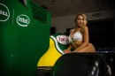 Bikini Blonde Christina Riordan Poses on Caterham Formula 1 Car