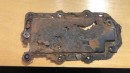 This is the steel fuse box cover in a Model S after some years: after it rusts, the battery pack fails