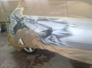BMW E70 X5 With .50 Desert Eagle Airbrushed on Its Side