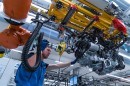 Various robots and robotized tools introduced by BMW in its factories