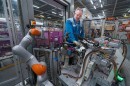 Various robots and robotized tools introduced by BMW in its factories