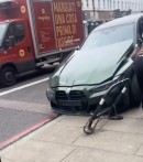 BMW M4 suspended in mid-air after crash in London