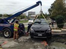 BMW X1 raised from sinkhole