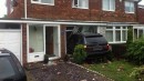 BMW X5 Crashes into house