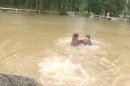 Heroic rescue of woman stuck in Mazda MX-5 caught by flood